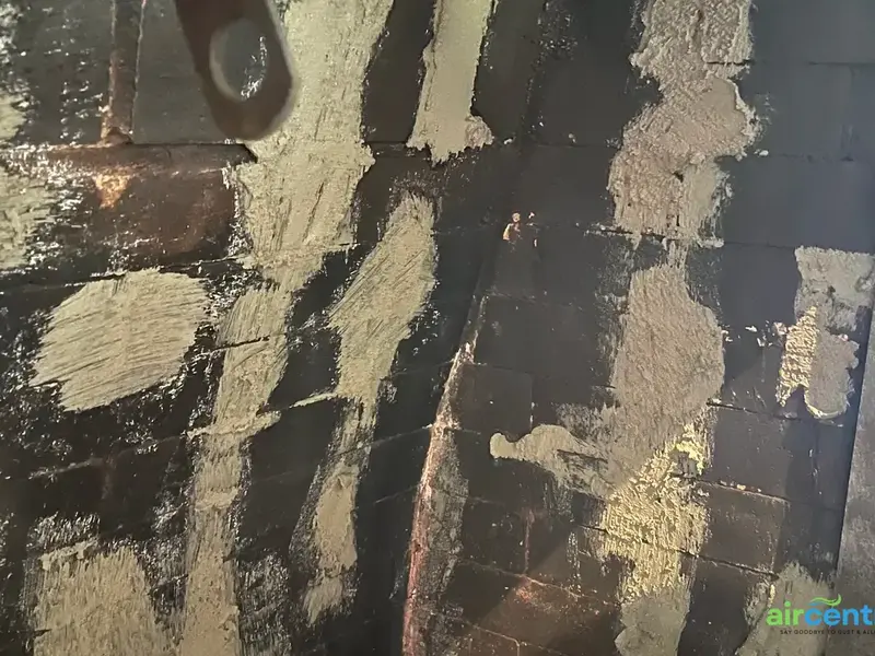 Before chimney sweep & repair in Austin TX - Flue Wall