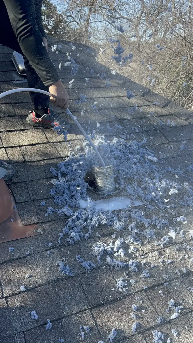 Dryer vent lint trap removed during professional cleaning service